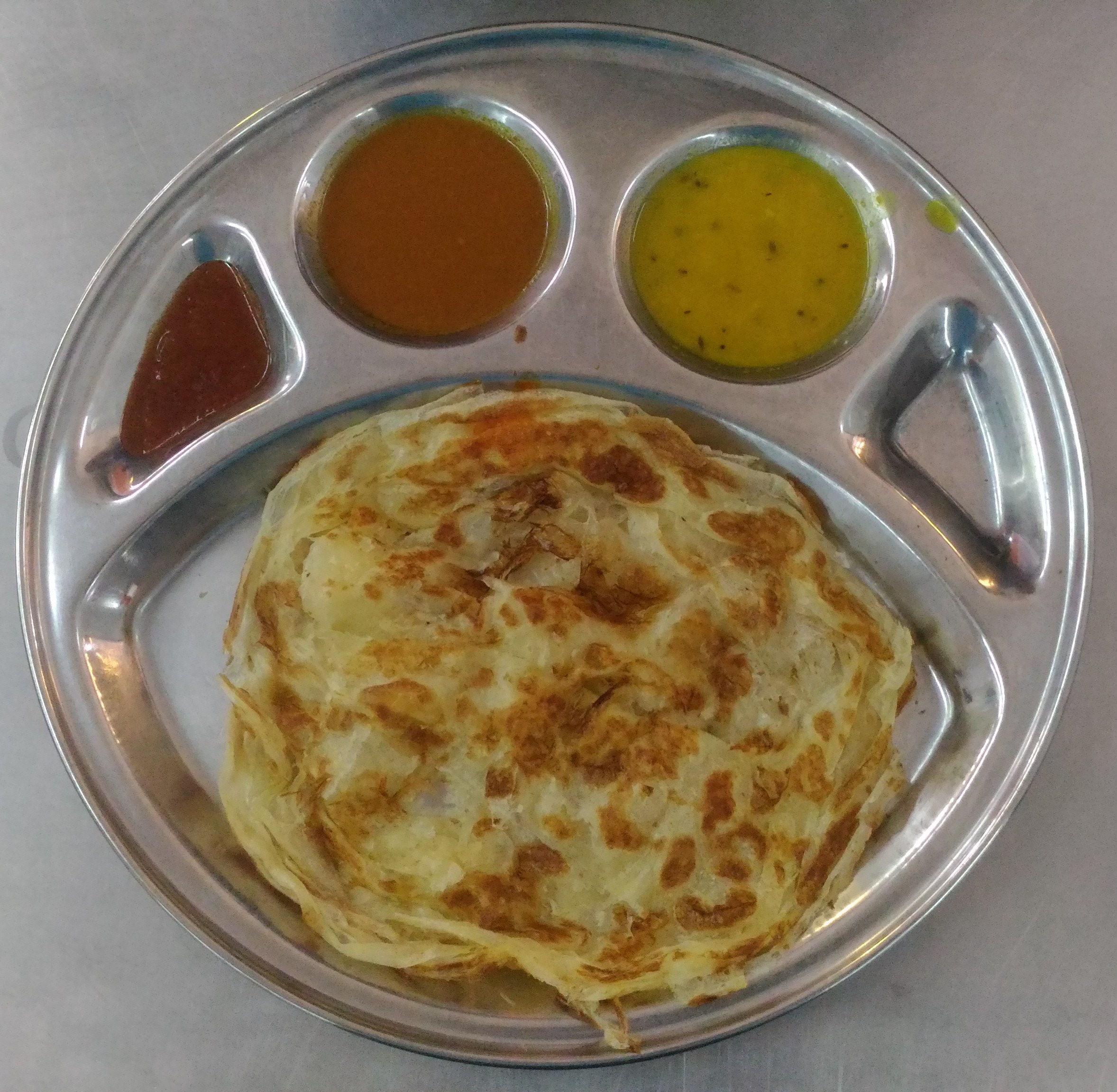 Rojak Daily/Nur Afiqah Dhal, sambal, or fish curry?